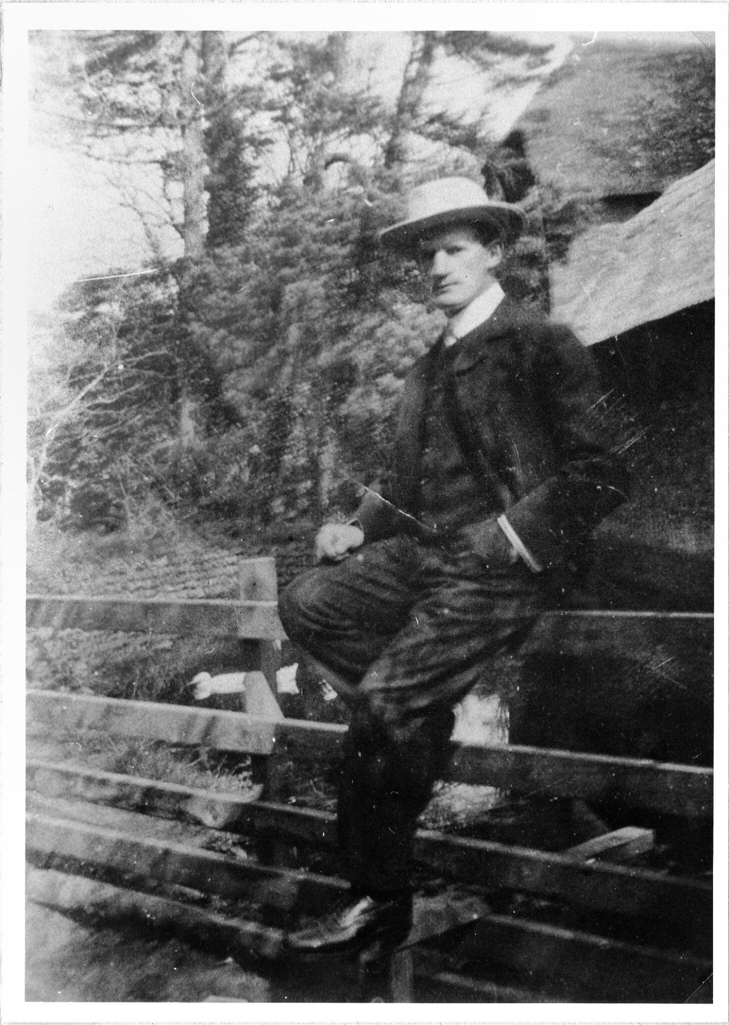 Holt Ball. Owen Crick with the pond in the background. Probably taken after his return from Canada.